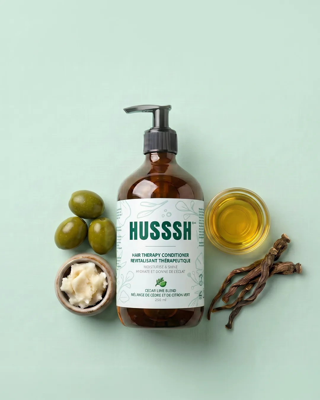 HUSSSH Hair Therapy Conditioner from above, with olives, shea butter, olive oil and dong quai root